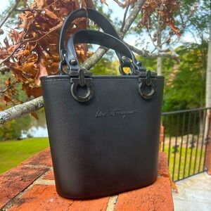 Salvador Ferragamo, classic black rubber hand bag.Hard to find!
